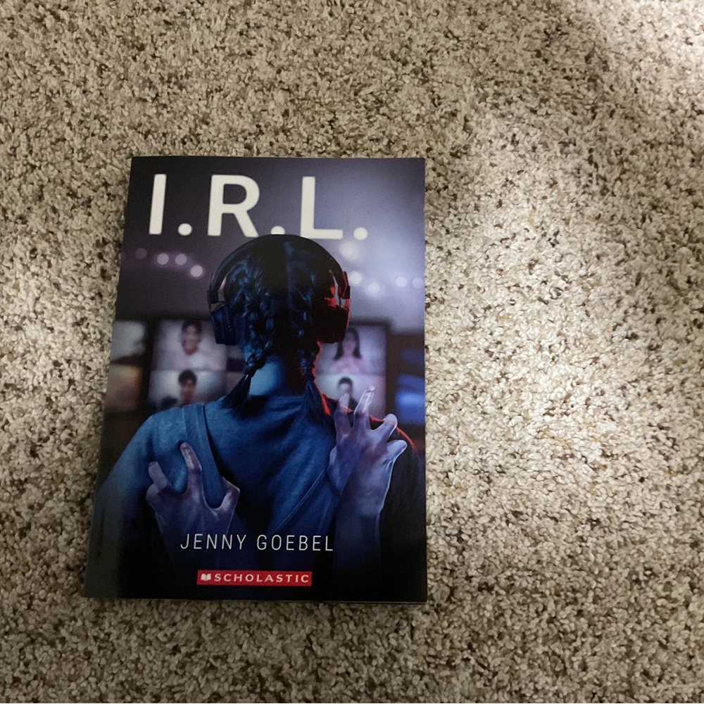 Scholastic I.R.L. Book with Blue and Black Cover